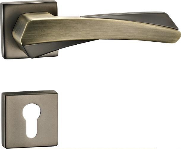 CERRADURA DE MANILLA CON ROSETA PARA DORMITORIO SERIE FERRARA ACERO/ BRONCE REF.CER.06.13 MARCA BARI