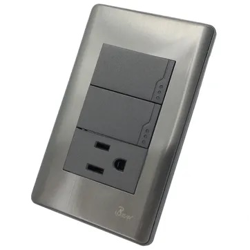 INTERRUPTOR DOBLE + TOMA C/TIERRA MOD.CURVO SERIE METALLO COLOR ACERO INOX REF. INT-06.12 MARCA BARI